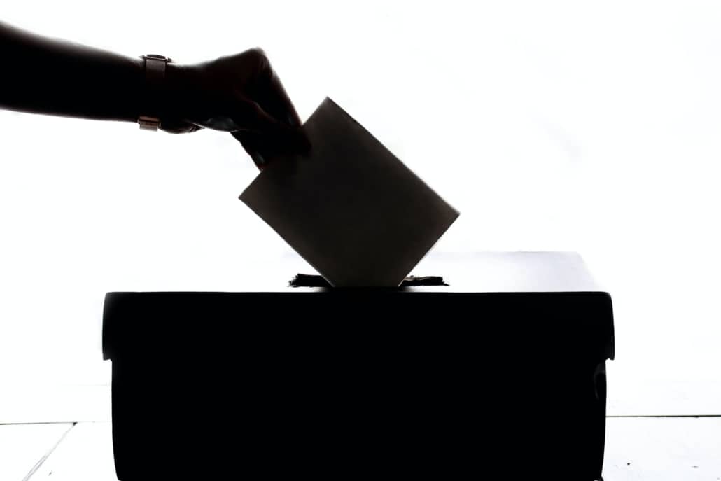 Voter casting a ballot during Canada's federal election 2021
