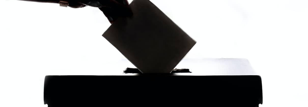 Voter casting a ballot during Canada's federal election 2021