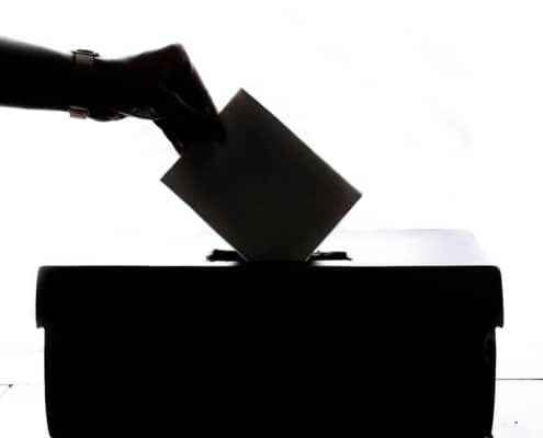 Voter casting a ballot during Canada's federal election 2021