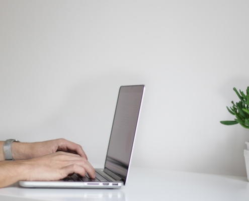 person at a computer filing a tax return