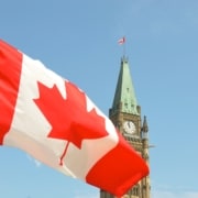 House of Commons and flag of Canada