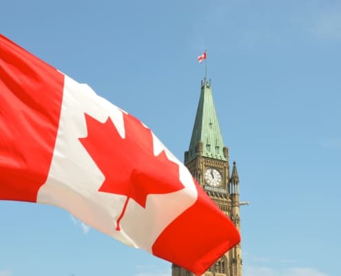 House of Commons and flag of Canada