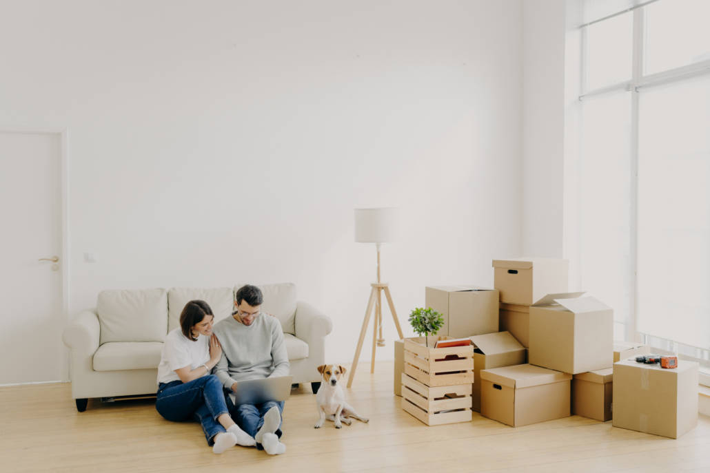 Couple relaxed at home discussing moving as a tax deduction