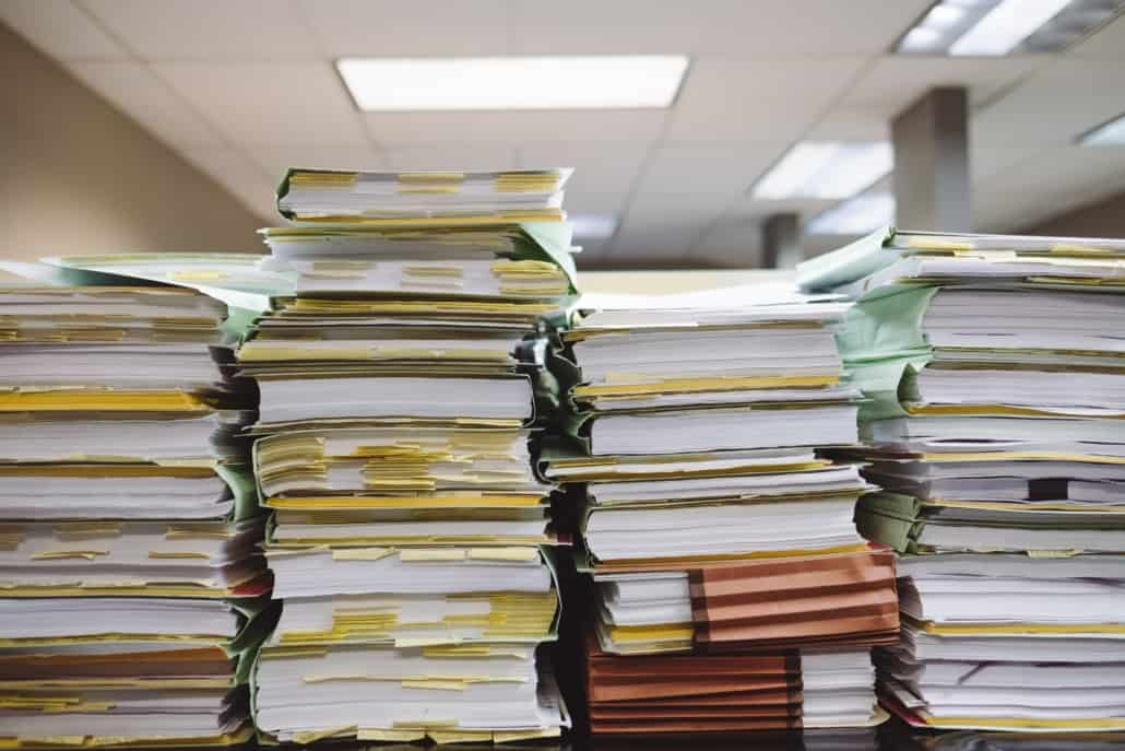 stacked papers illustrating corporate paper filing limit