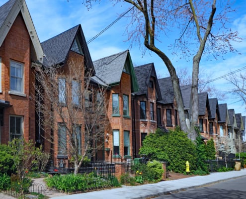 Houses illustrating how CRA has simplified Underused Housing Tax