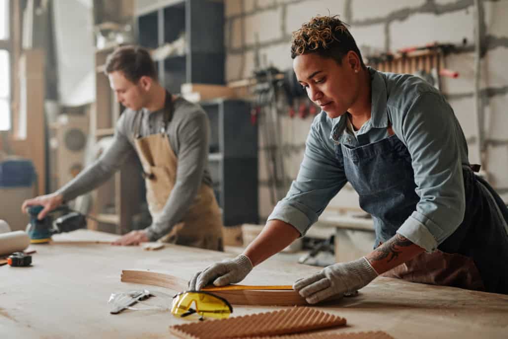 Woodworking shop discussing CEBA loans