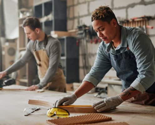 Woodworking shop discussing CEBA loans