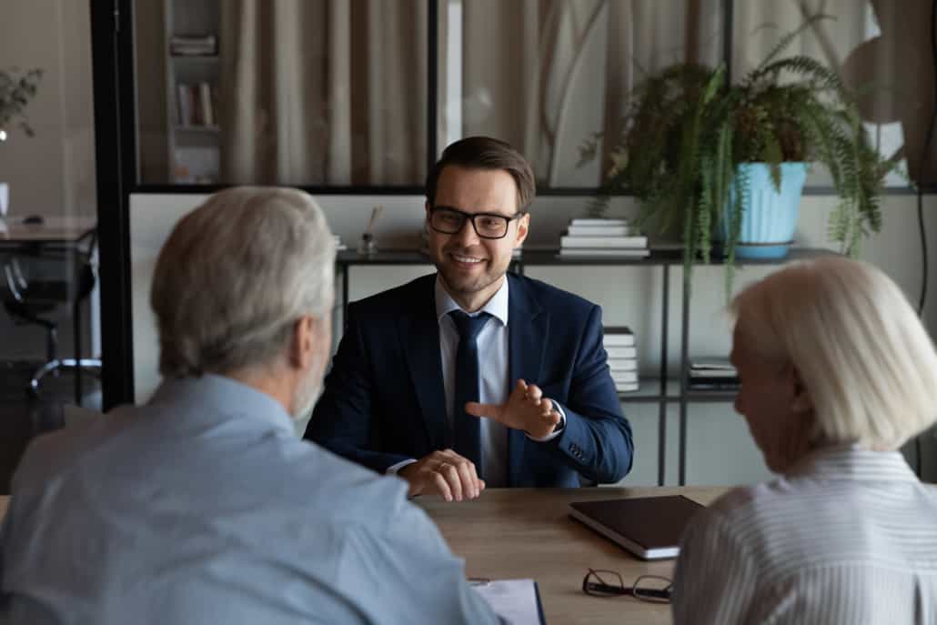 Lawyer discussing a family trust with his clients