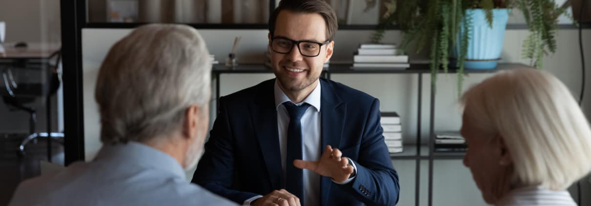 Lawyer discussing a family trust with his clients