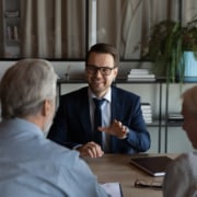 Lawyer discussing a family trust with his clients