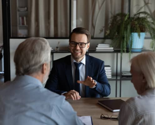 Lawyer discussing a family trust with his clients