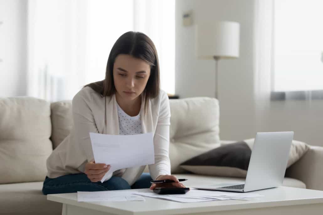 woman trying to figure out why her taxes are so complicated