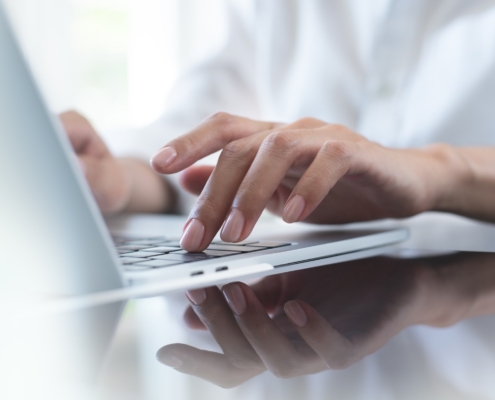 A person working at a computer using Karbon client management platform