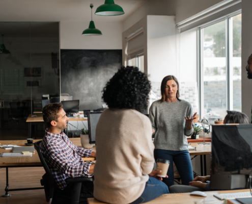 Business people discussing the Ontario Small Business tax cut